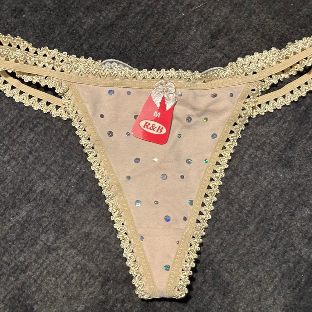 Beige R&B woman’s panties Butterfly themed back